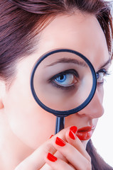 Women with magnifying glass