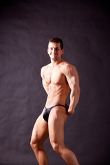 Fototapeta premium young bodybuilder posing