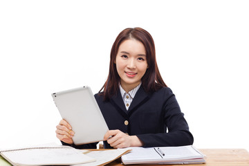 Young Asian student girl using tablet PC