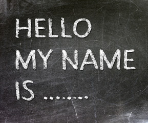 Hello my name is handwritten with white chalk on a blackboard. © roobcio