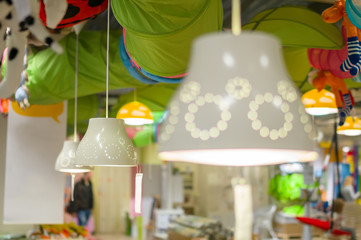 Modern hanging lamps with dotted pattern in supermarket