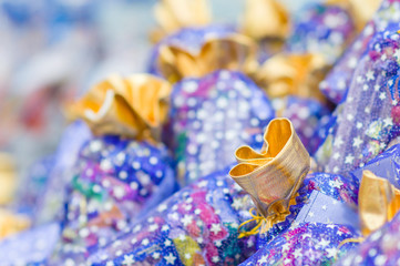 Obraz premium Christmas bags and boxes with candy sweets gifts in supermarket