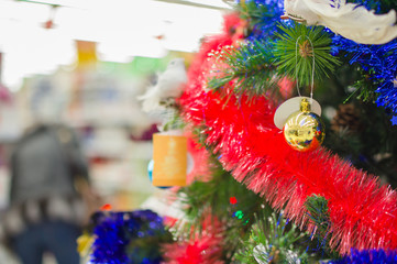 Christmas tree decorated with lights, garlands and toys in super