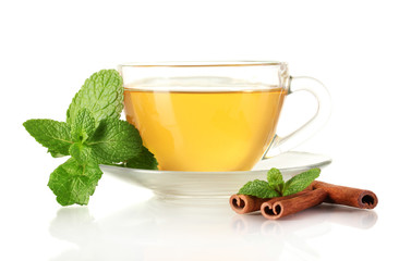 Cup of tea with mint and cinnamon isolated on white