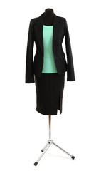 Turquoise blouse and black skirt with coat