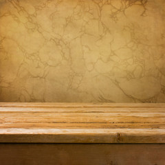 Background with empty wooden deck table over brown wall