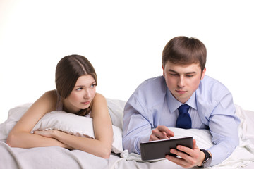 girl, man and pad in a bedl