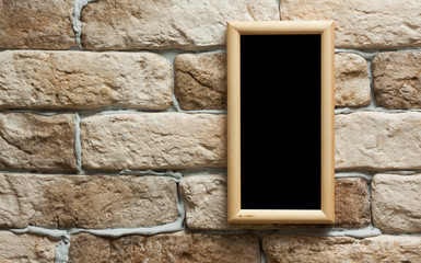 photo frame on brick wall