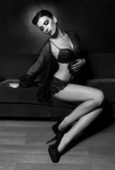 Fototapeta premium Beautiful Sexy Woman on a Couch