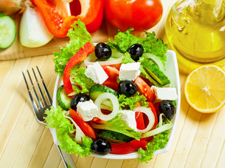 Greek vegetable salad with feta cheese, top view