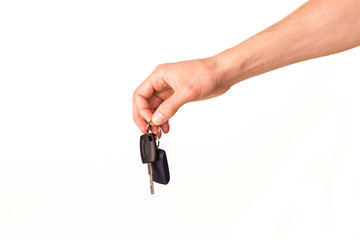 Male hand holding a car key