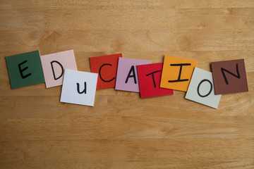 'EDUCATION' on letter tiles - education, schools, teaching.