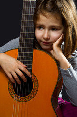 Litlle girl and her Guitar