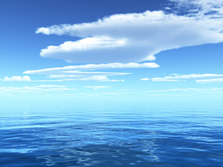 Fototapeta na wymiar blue sky leaving for horizon above a blue surface of the sea