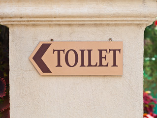 Obraz premium Toilet sign on a wall