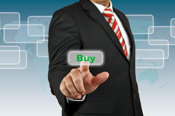 Businessman push Buy button