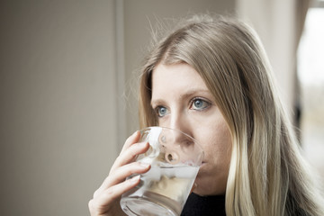 Young Woman Drinking Water