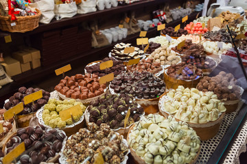 counter of the store with handmade chocolate