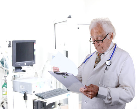 doctor in pulmonary function lab looking at a clipboard