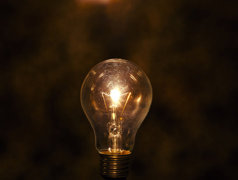 light bulb with low key   background conception for idea cr