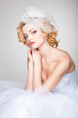 beautiful bride posing dramatic in the studio