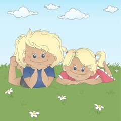 Children lying on a grass