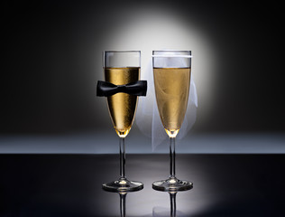 Champagne glasses with conceptual heterosexual decoration