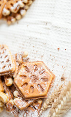 ruddy homemade waffles with powder and wheat ears