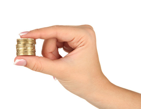 Woman hands with coins isolated on white.