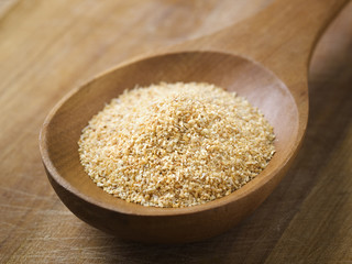 Garlic on a wooden spoon