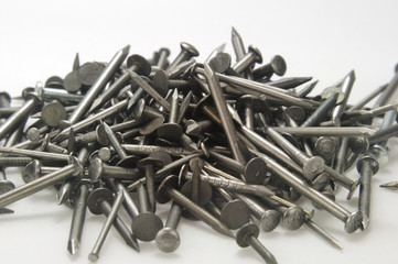 heap of iron nails on white background - DSC0928