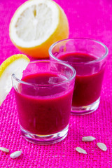 Beetroot cream soup with lemon in glass