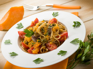 spaghetti with pumpkin anchovy caper and fresh tomatoes
