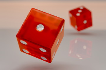 Two glossy red plastic rolling dices