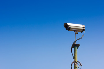 Security camera with a sky background