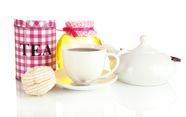 Jar and cup of tea isolated on white