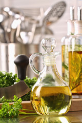 Bottle of olive oil and fresh parsley
