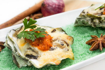 Oyster shell with cheese