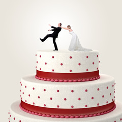 White red wedding cake topper, groom tries to run away from the wedding