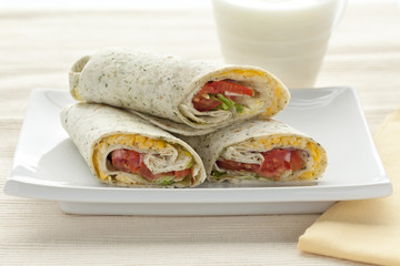 Lunch with spinach wraps with cheese