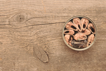 open food can on a wooden table