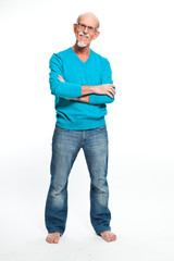 Senior man well dressed and smiling. Isolated.