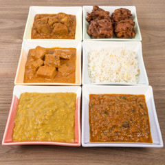 Thali - Indian vegetarian and meat curries, rice and bhajis