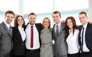 Obraz premium Closeup portrait of a successful business team laughing together