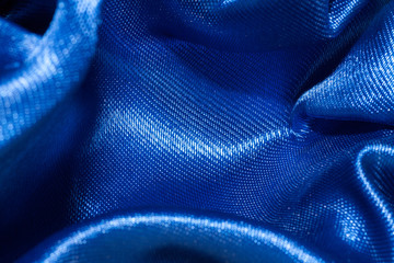 Fototapeta premium Blue satin textile background
