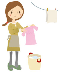 洗濯物を干す女性