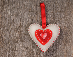 Heart over wooden background