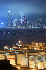 Oil Storage tanks with urban background in Hong Kong