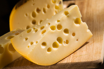 Cheese on wooden board