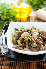 Pickled honey mushrooms with chives